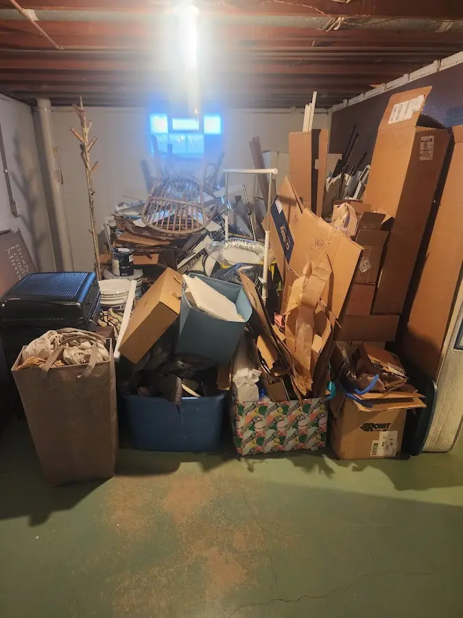 Roll-off dumpster container at job site for Yard Waste Dumpster Rental in Little Falls